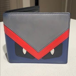 Fendi monster wallet used